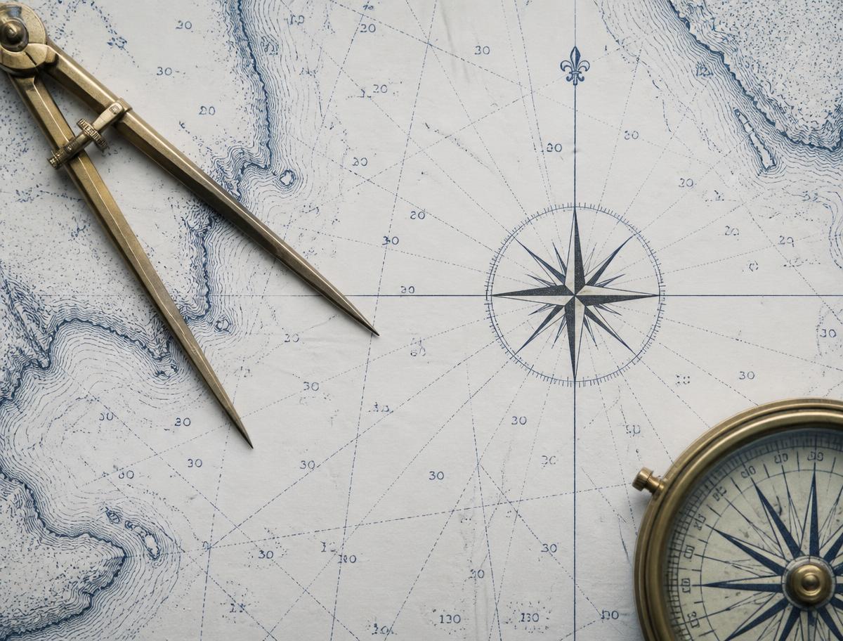 Carte marine avec compas et pointe sèche, illustrant la planification de navigation (image représentative)